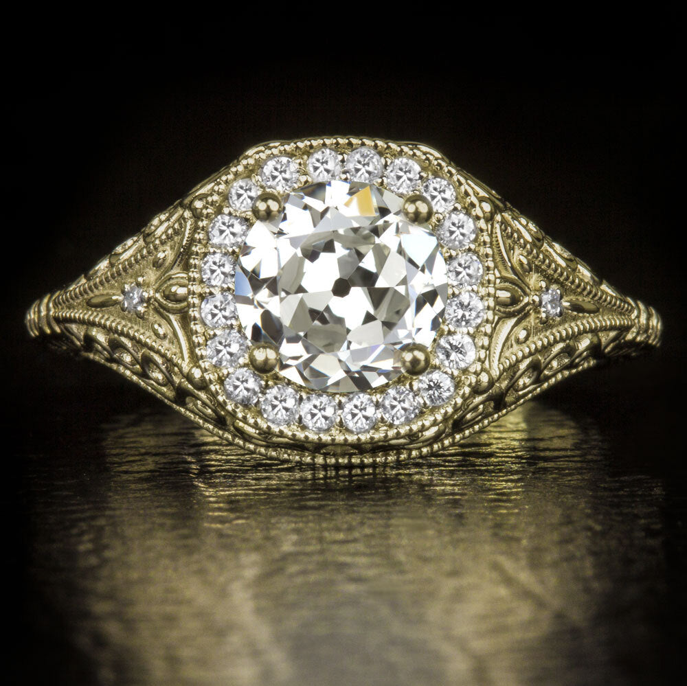 Vintage 1ct old European cut diamond engagement ring with halo and intricate filigree setting, GIA certified.