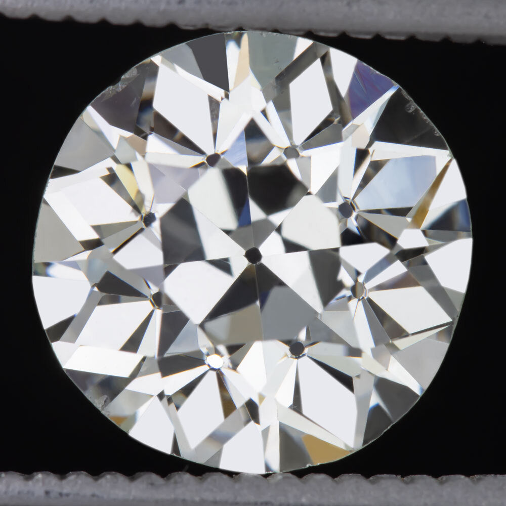 4.07ct GIA certified loose old European cut diamond with SI1 clarity on a black background.