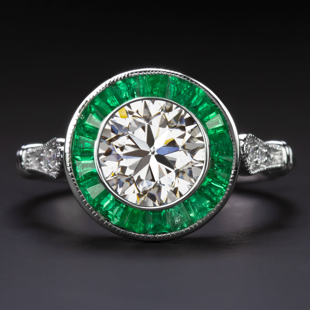Diamond ring surrounded by emeralds Clearance
