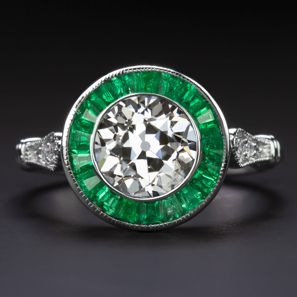 Vintage 2.75 Carat Emerald and Diamond Halo Ring