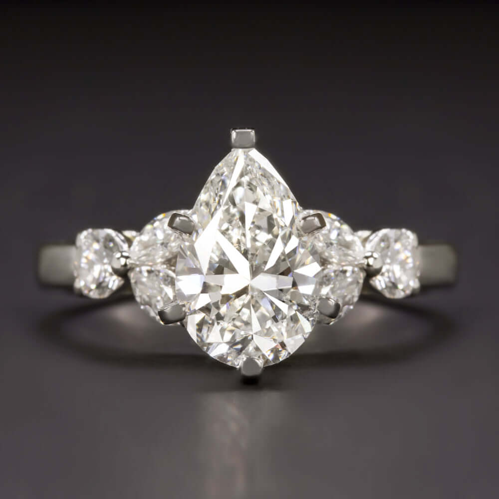 Pear Shape Diamond Halo & Diamond Band Engagement Ring 18kt White Gold GIA